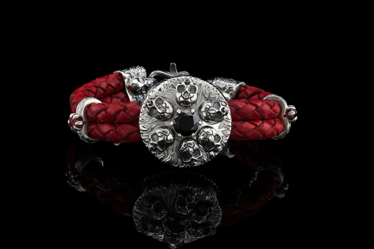 Furious Bonnie silver skull medallion bracelet on red braided leather, front view