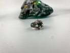 Furious Bonnie ring front view, miniature skulls around the green stone