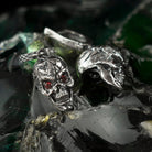 Headhunter skull drop earrings, close-up of the red stone eyes