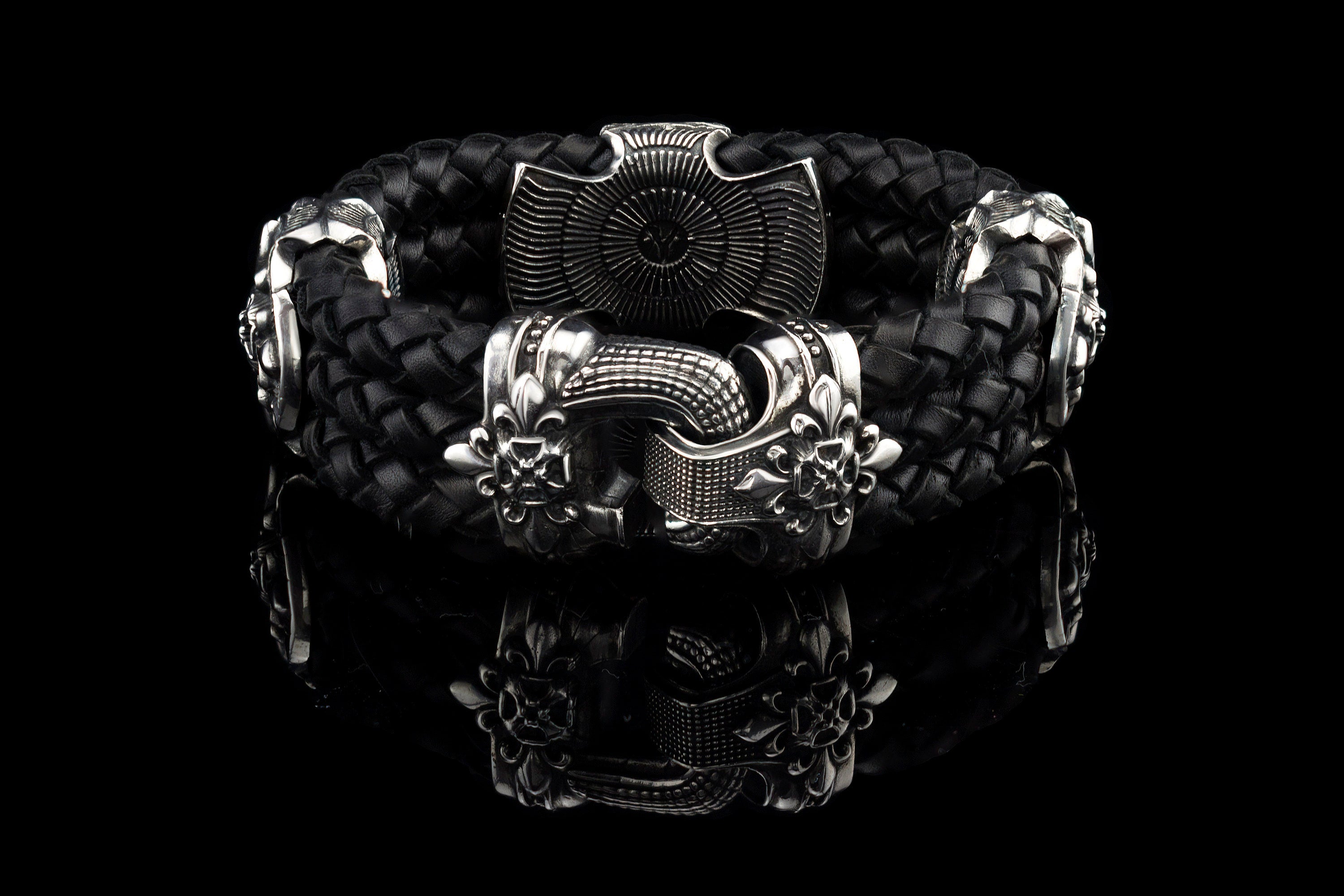 Heavy sterling silver skull bracelet on black braided leather, front 2