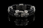 Heavy sterling silver skull bracelet on black braided leather, front 2