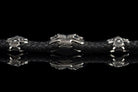 Heavy sterling silver skull bracelet on black braided leather, straight 2