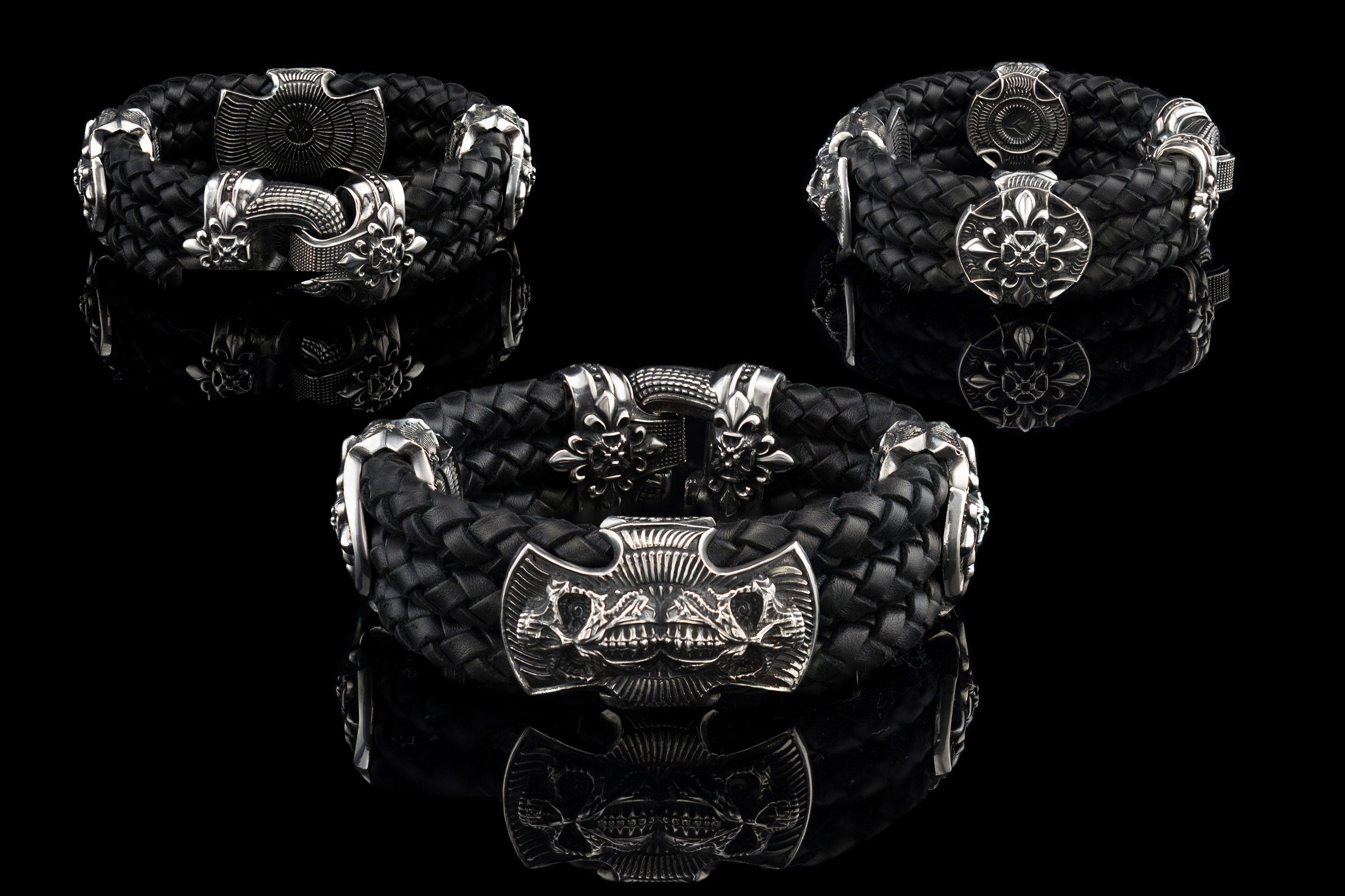 Heavy sterling silver skull bracelet on black braided leather, three views