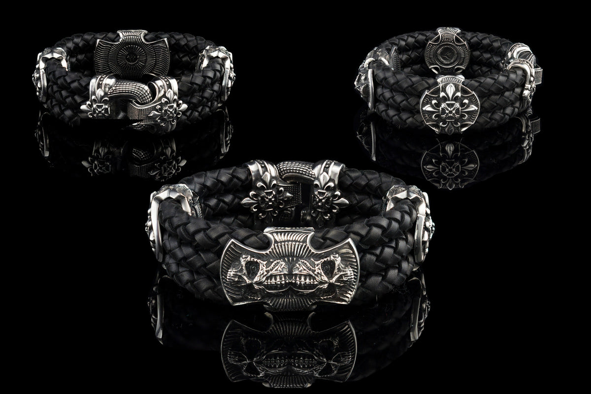 Heavy sterling silver skull bracelet on black braided leather, three views