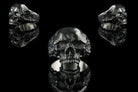 Hellbound sterling silver skull ring shown from front and both sides on black