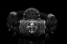 Crowned skull bracelet with 925 sterling silver details, genuine black braided leather and red cubic zirconia eyes