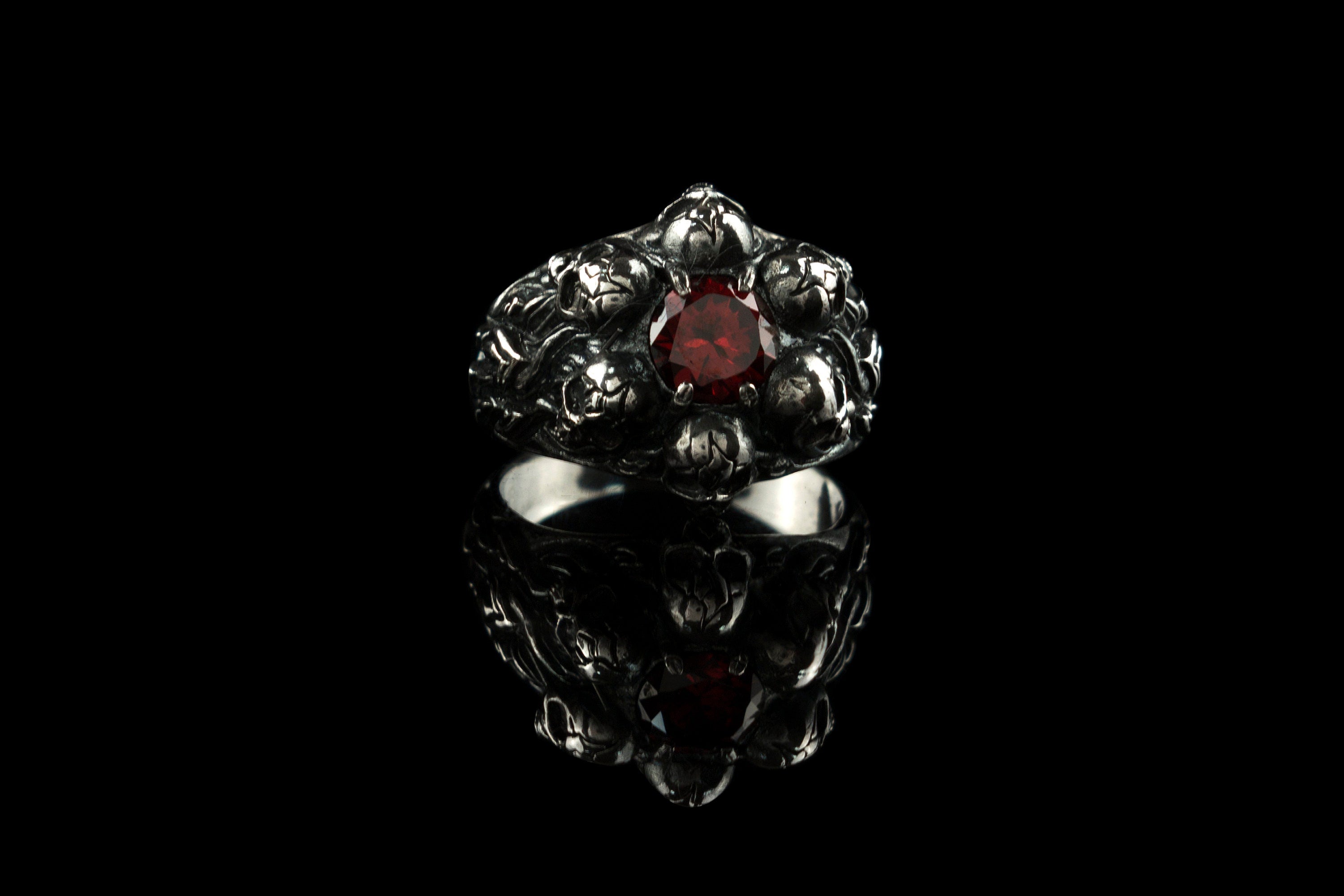 Furious Bonnie 925 sterling silver skull ring with Pyrope Red cubic zirconia and hand-oxidized gothic details