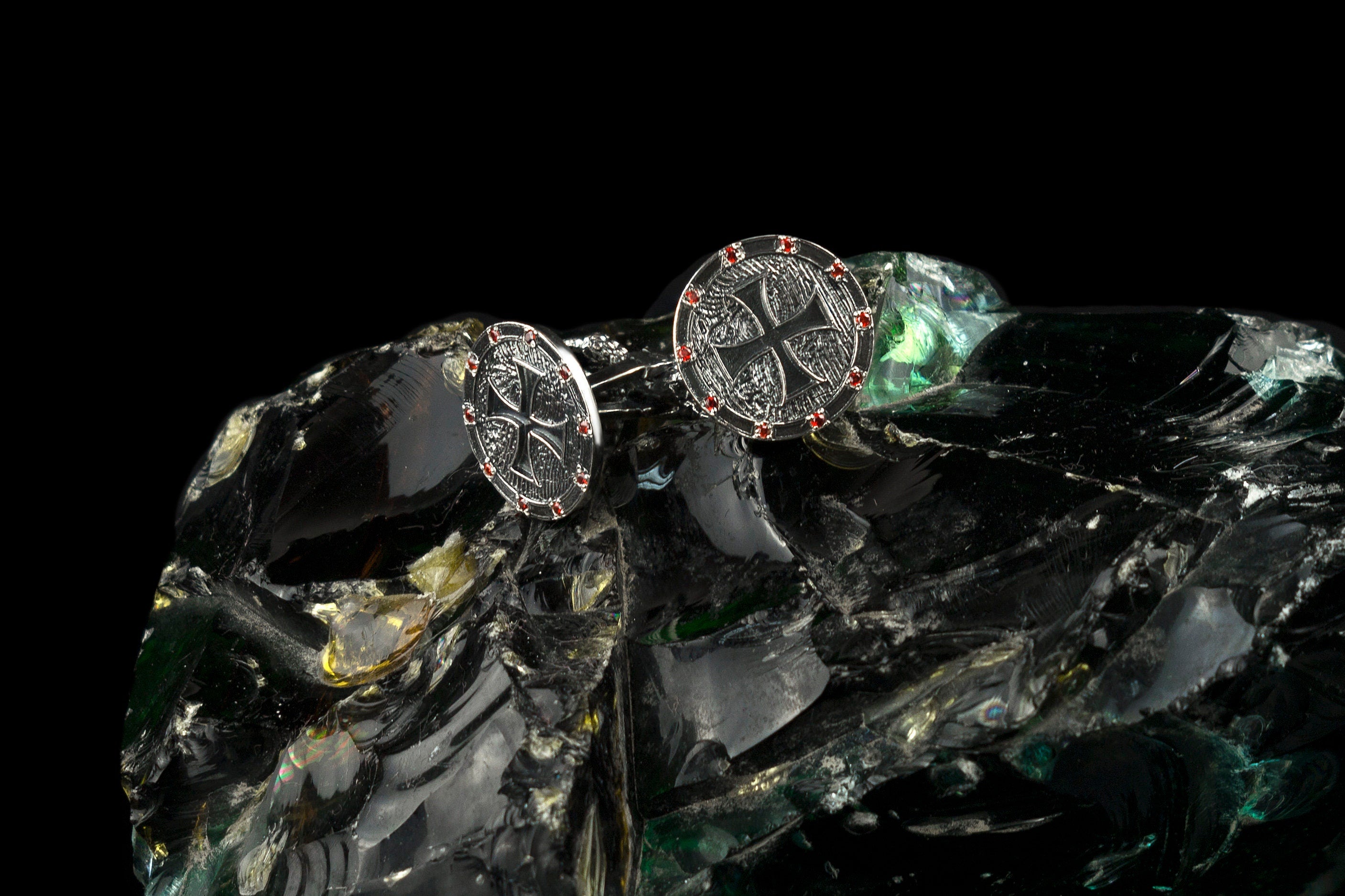Maltese cross cufflinks in 925 sterling silver with textured engraving and cubic zirconia accents.