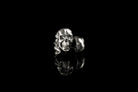 Close-up of Edward sterling silver skull cufflinks showing detailed skull relief