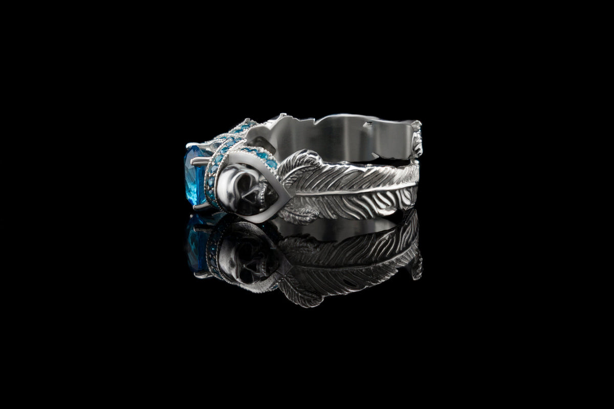 Atropos 925 sterling silver skull ring with blue cubic zirconia and double skull gothic design