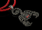 Scorpion Emperor black pendant in 925 sterling silver with dark cubic zirconia stones, red eyes, and a braided leather cord.