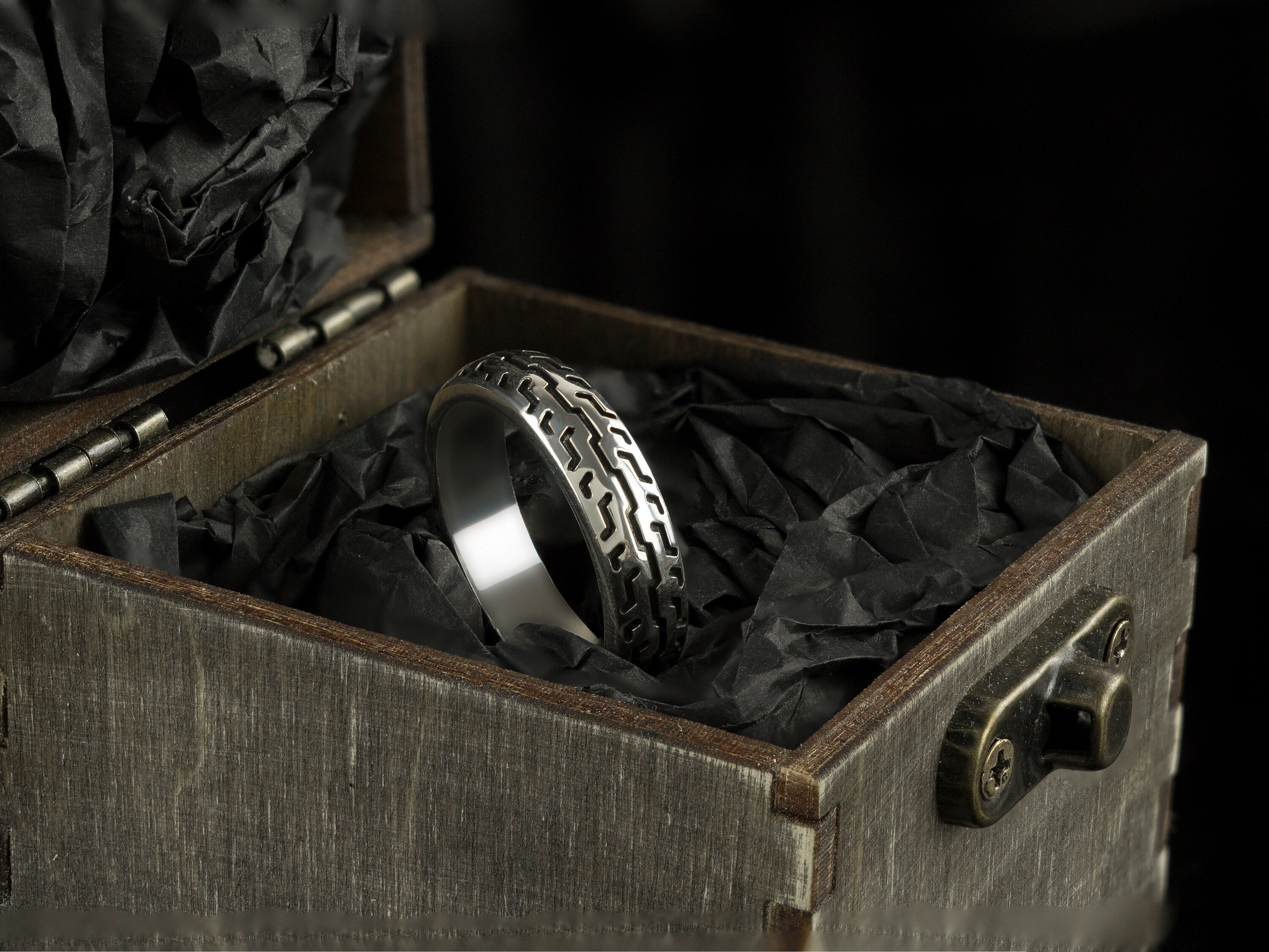 925 sterling silver motorcycle tire ring with deep geometric tread pattern and polished inner band