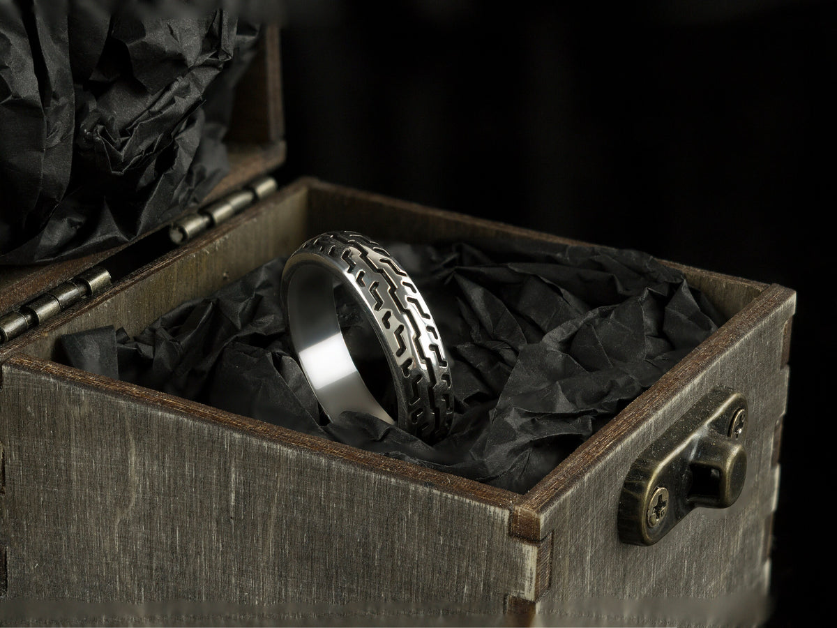 925 sterling silver motorcycle tire ring with deep geometric tread pattern and polished inner band
