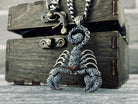 Scorpion Emperor Blue 925 sterling silver pendant with blue cubic zirconia stones, red eye accents, sculpted claws, and curved tail.