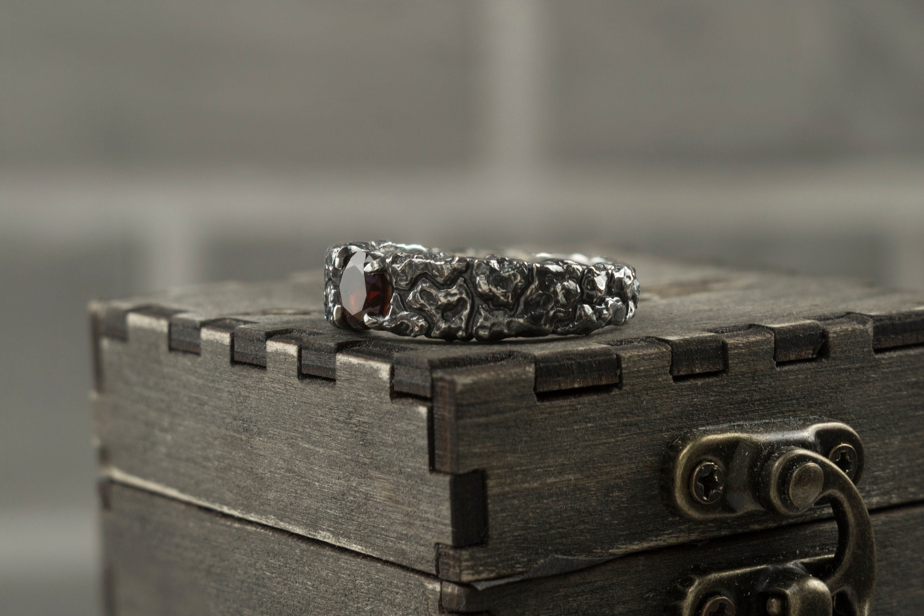 MONS IGNEUS 925 sterling silver ring with natural deep red garnet and rugged volcanic rock-inspired texture
