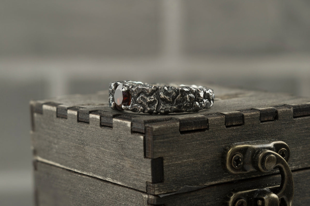 MONS IGNEUS 925 sterling silver ring with natural deep red garnet and rugged volcanic rock-inspired texture