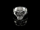 Beliar gothic skull ring handcrafted from 925 sterling silver with polished skull details, photographed against a black background.