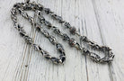 Heavy 925 sterling silver Fleur de Lis and crowned skull chain with detailed gothic links and gemstone skull eyes