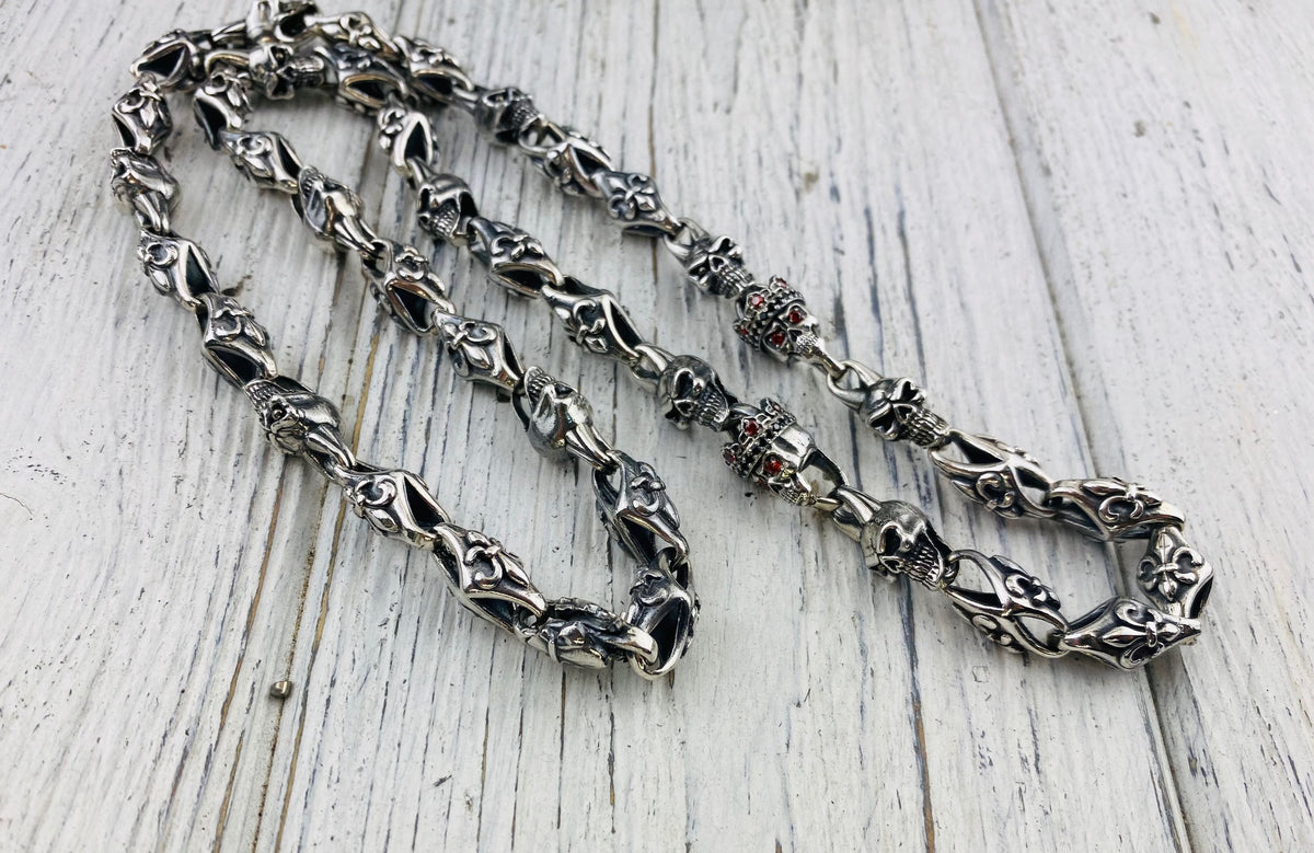 Heavy 925 sterling silver Fleur de Lis and crowned skull chain with detailed gothic links and gemstone skull eyes