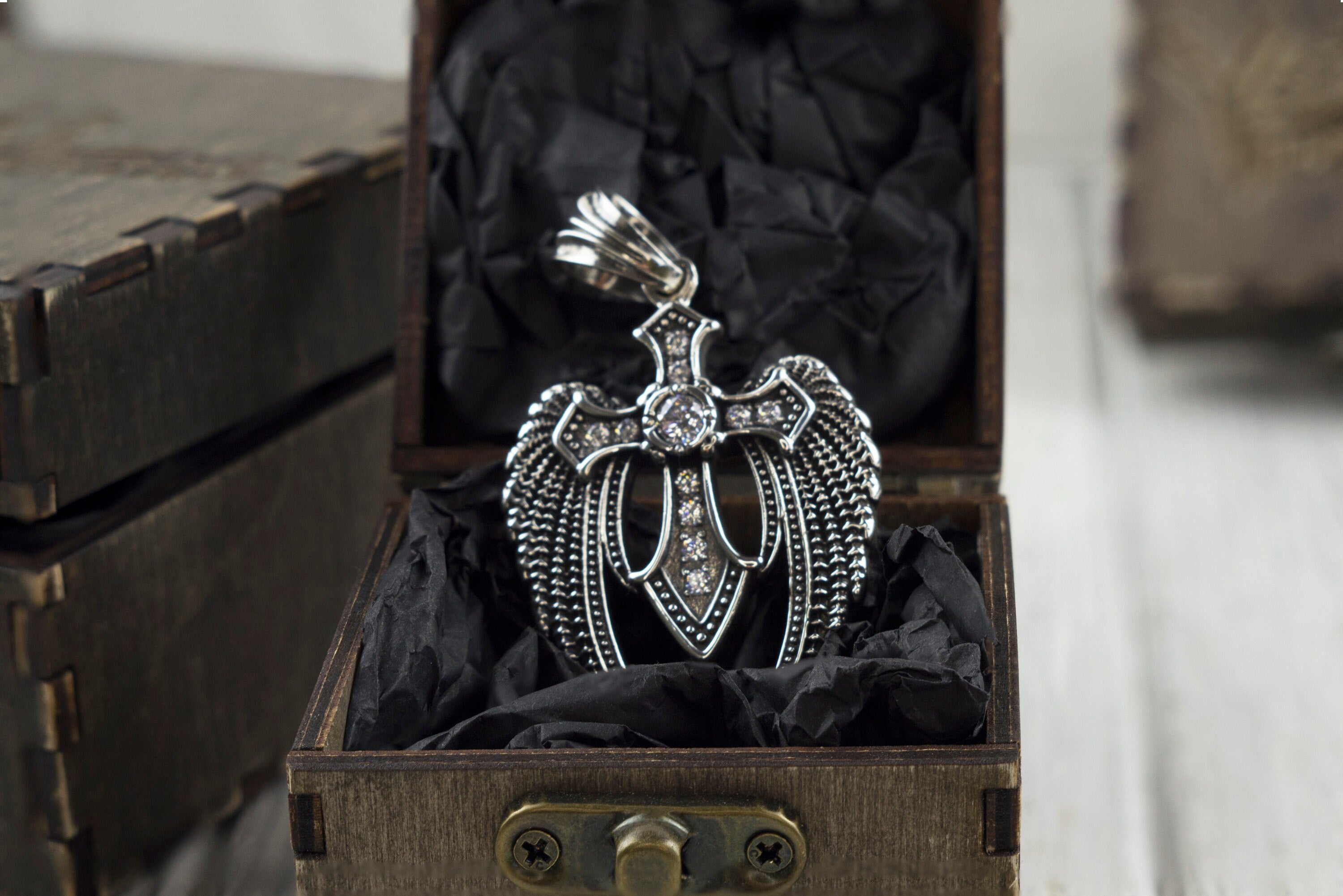 Large 925 sterling silver Angel Cross pendant with sculpted wings, central cross and clear cubic zirconia details