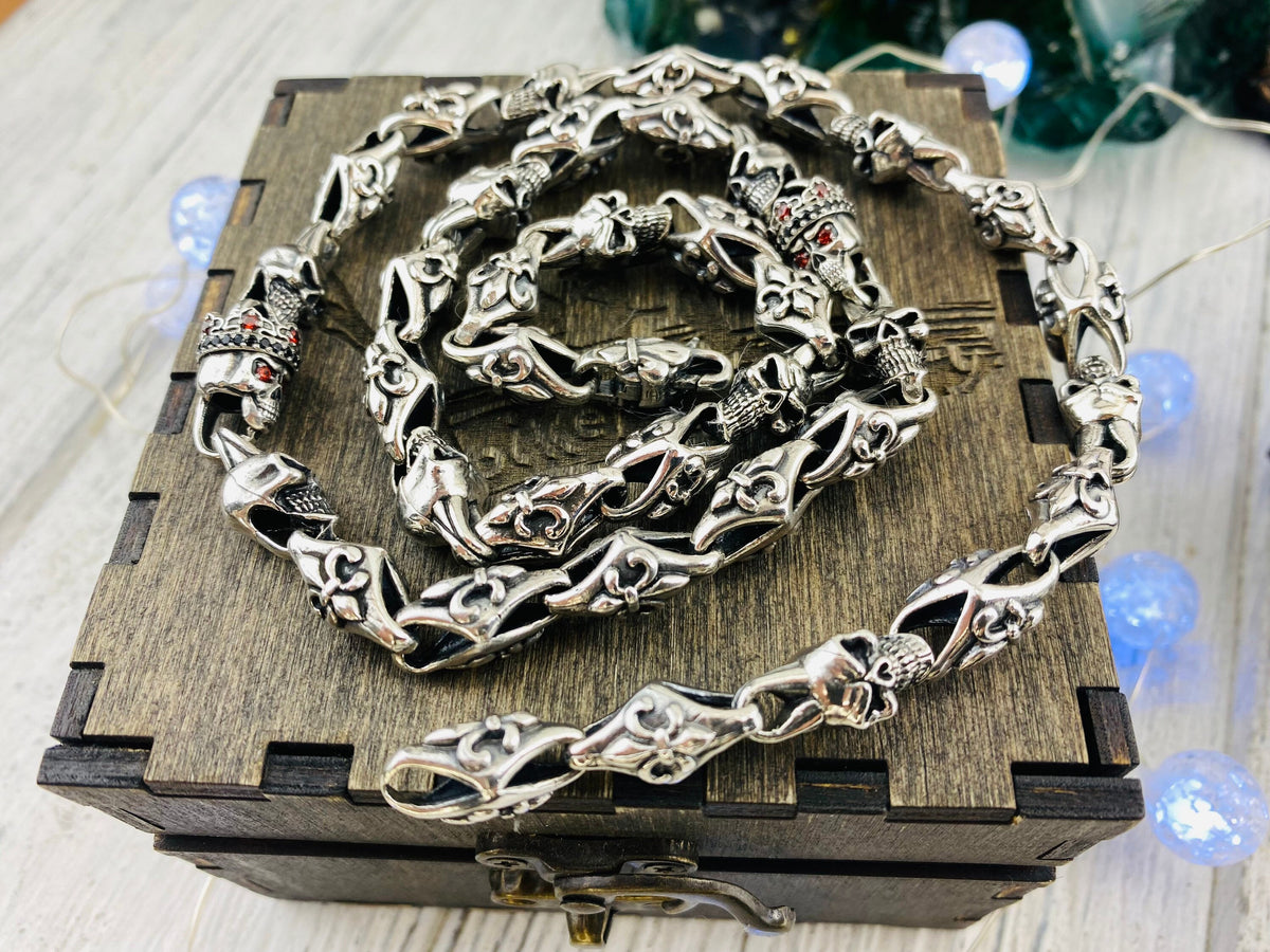 Heavy 925 sterling silver Fleur de Lis and crowned skull chain with detailed gothic links and gemstone skull eyes