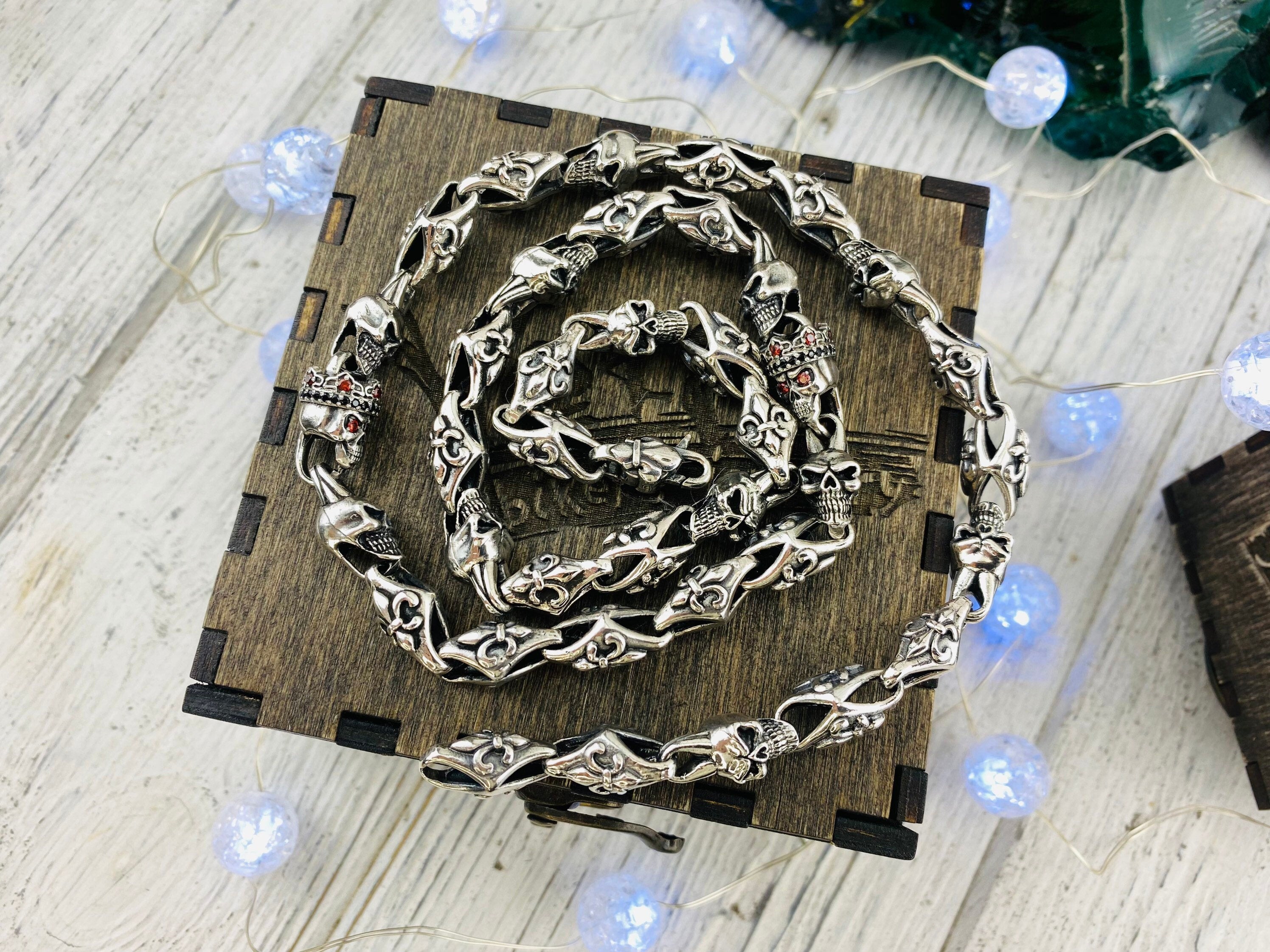 Heavy 925 sterling silver Fleur de Lis and crowned skull chain with detailed gothic links and gemstone skull eyes
