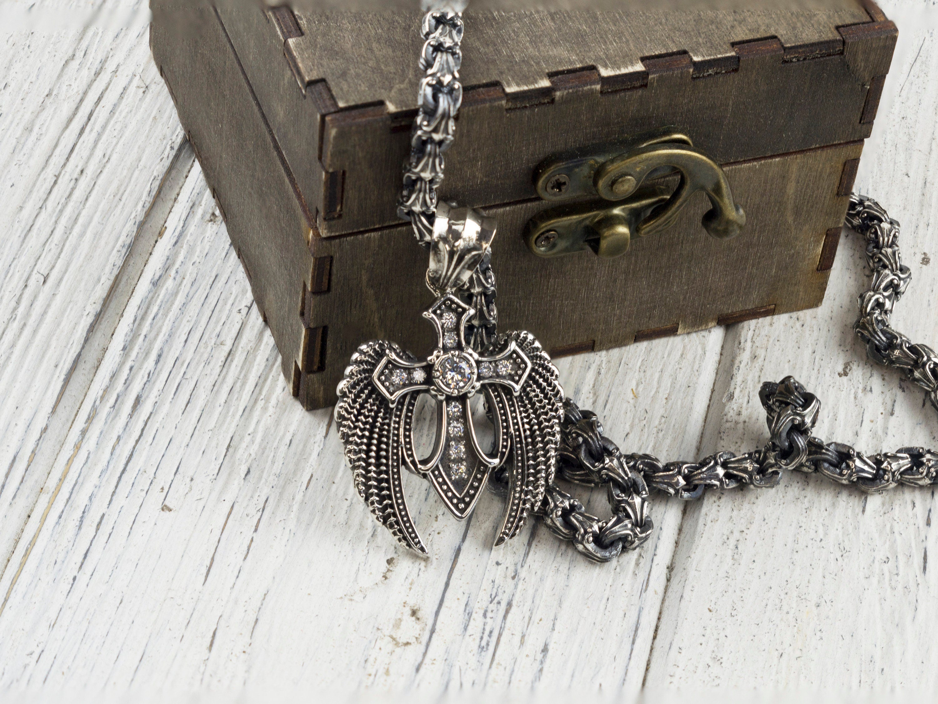 Large 925 sterling silver Angel Cross pendant with sculpted wings, central cross and clear cubic zirconia details
