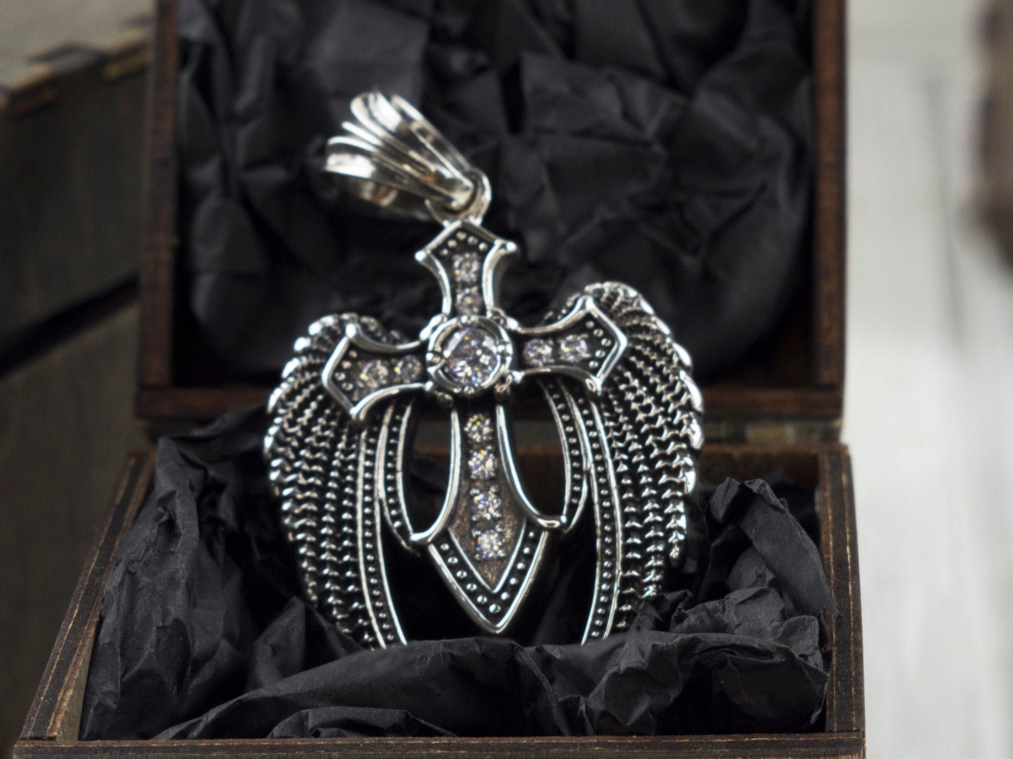 Large 925 sterling silver Angel Cross pendant with sculpted wings, central cross and clear cubic zirconia details
