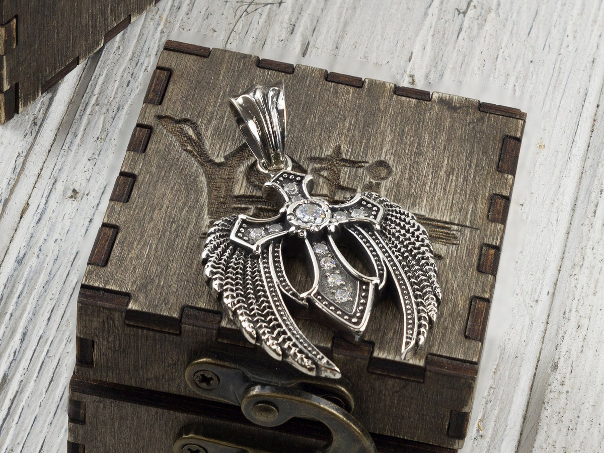 Large 925 sterling silver Angel Cross pendant with sculpted wings, central cross and clear cubic zirconia details