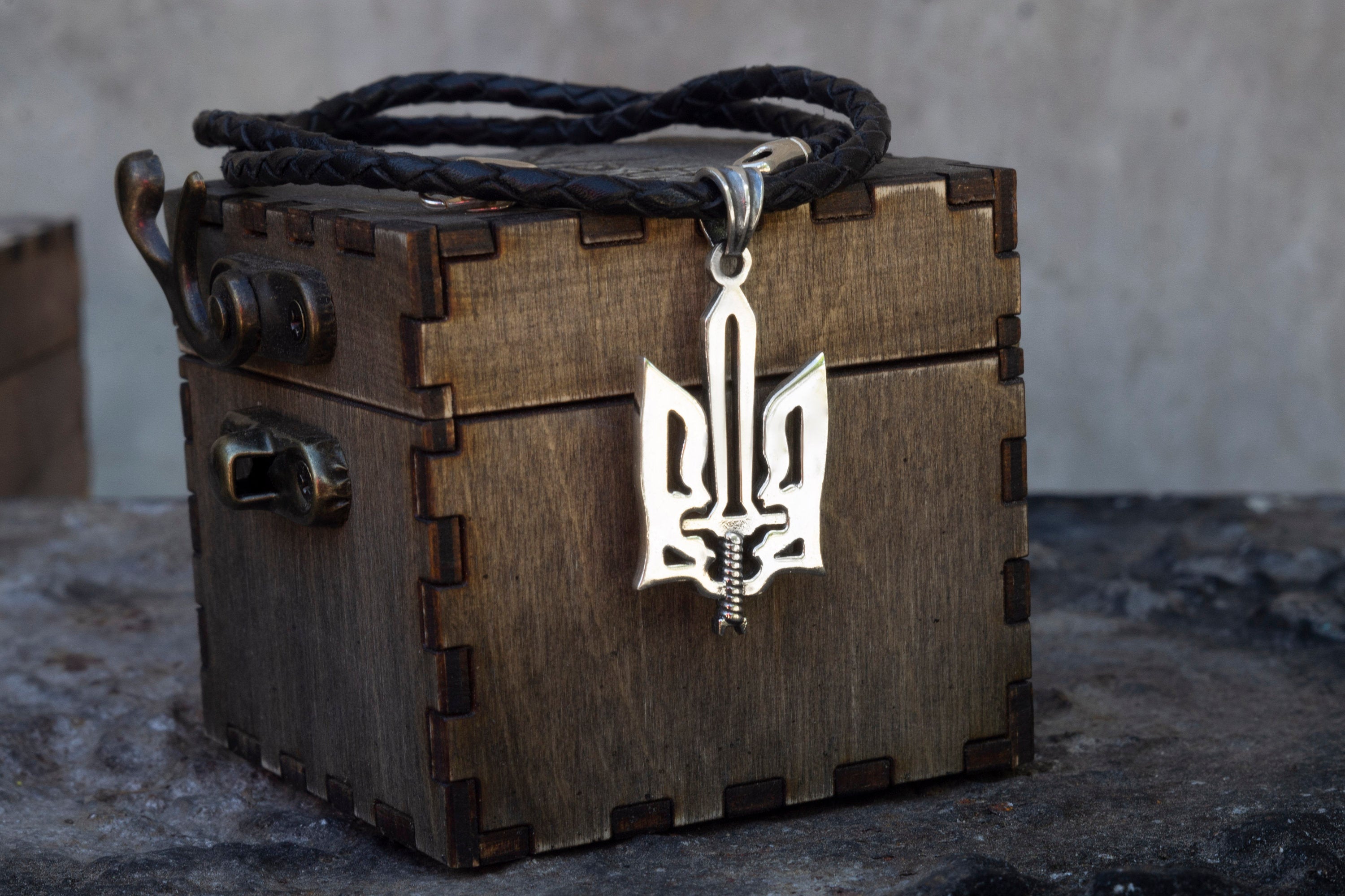 Oxidized 925 sterling silver Ukrainian Tryzub pendant with an integrated sword, 36 mm tall