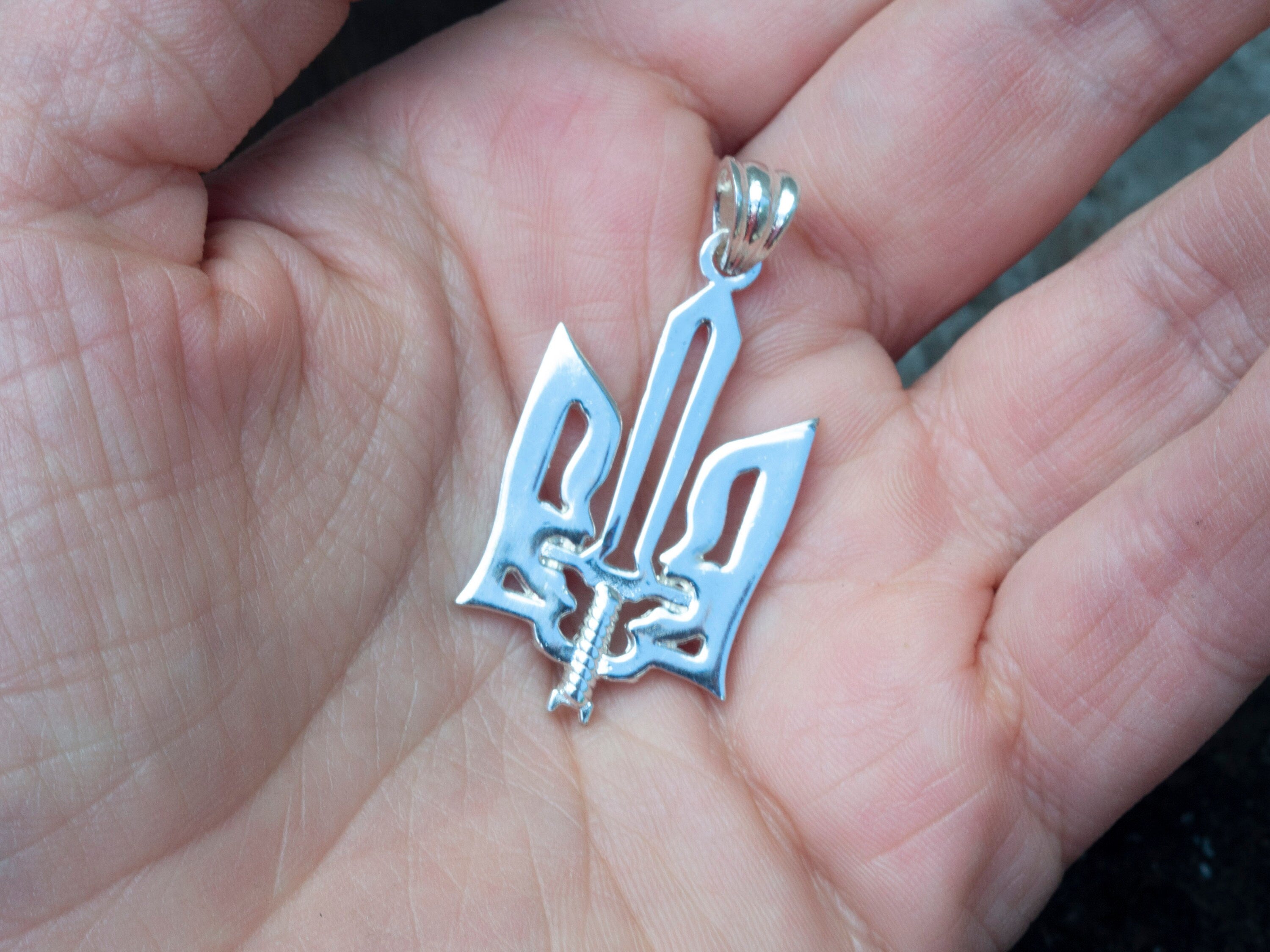 Oxidized 925 sterling silver Ukrainian Tryzub pendant with an integrated sword, 36 mm tall