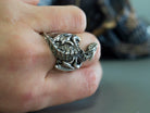 925 sterling silver Dragon’s Grasp ring with detailed sculptural dragon, scales and claw design

