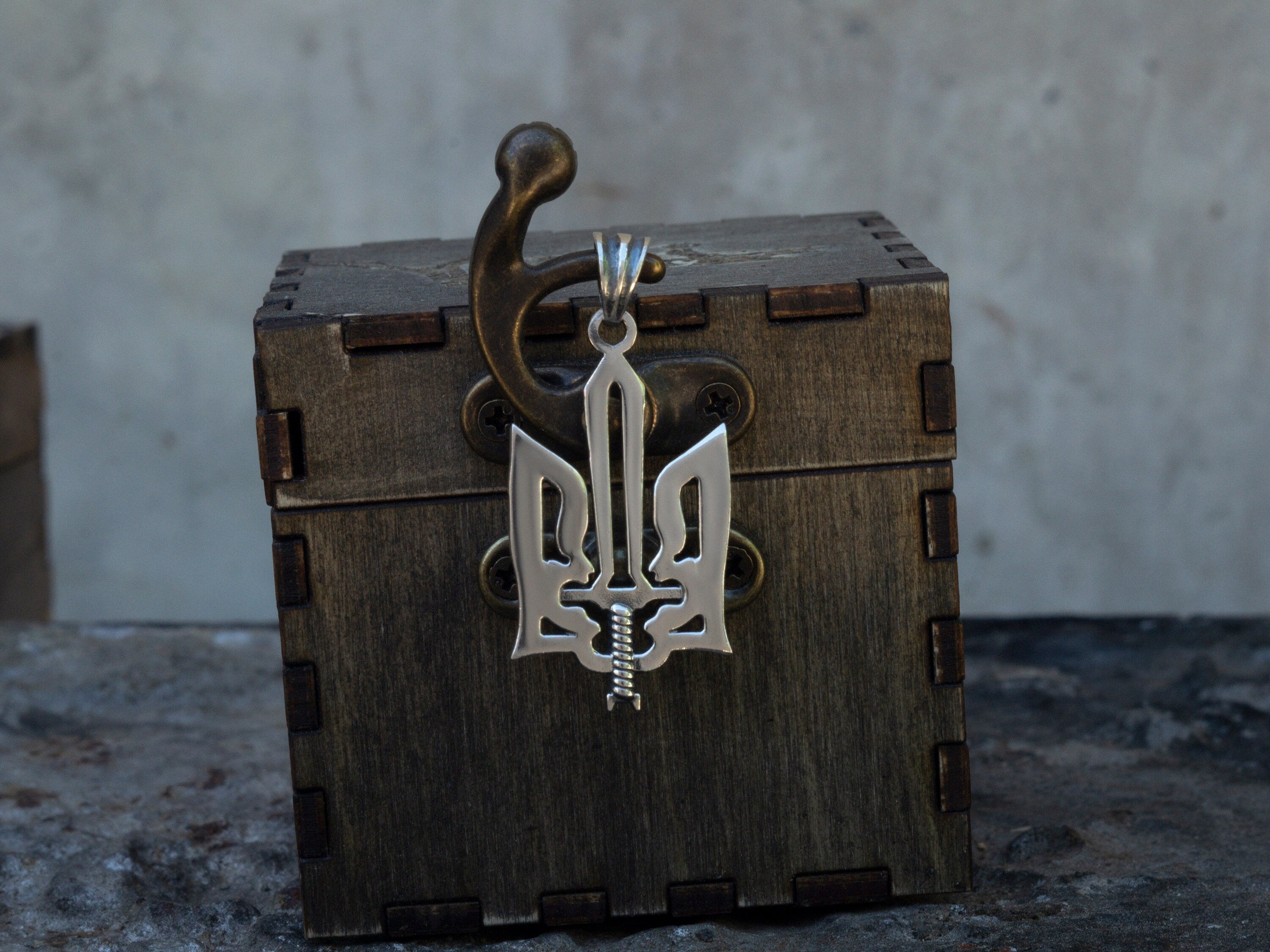 Oxidized 925 sterling silver Ukrainian Tryzub pendant with an integrated sword, 36 mm tall
