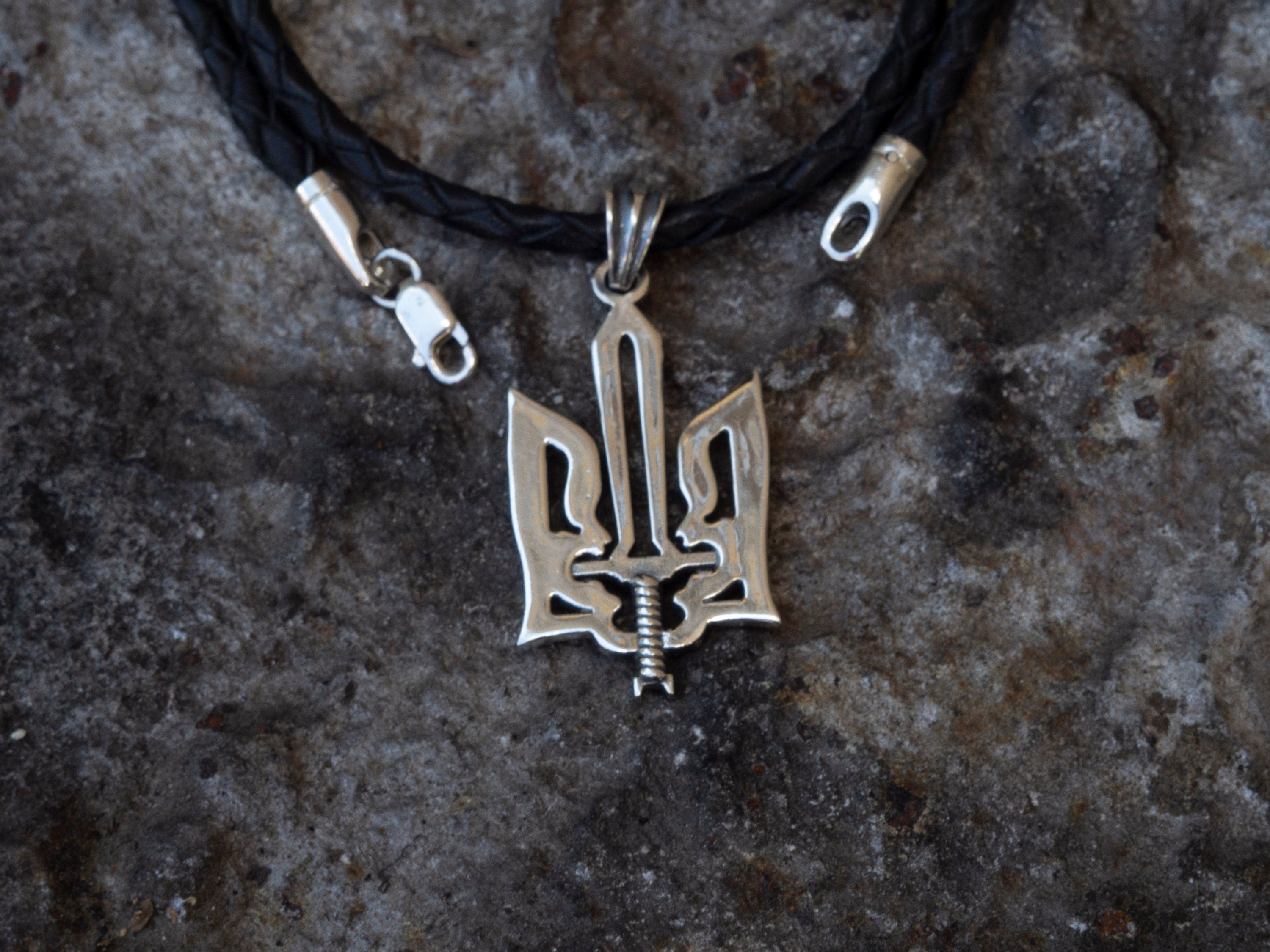 Oxidized 925 sterling silver Ukrainian Tryzub pendant with an integrated sword, 36 mm tall