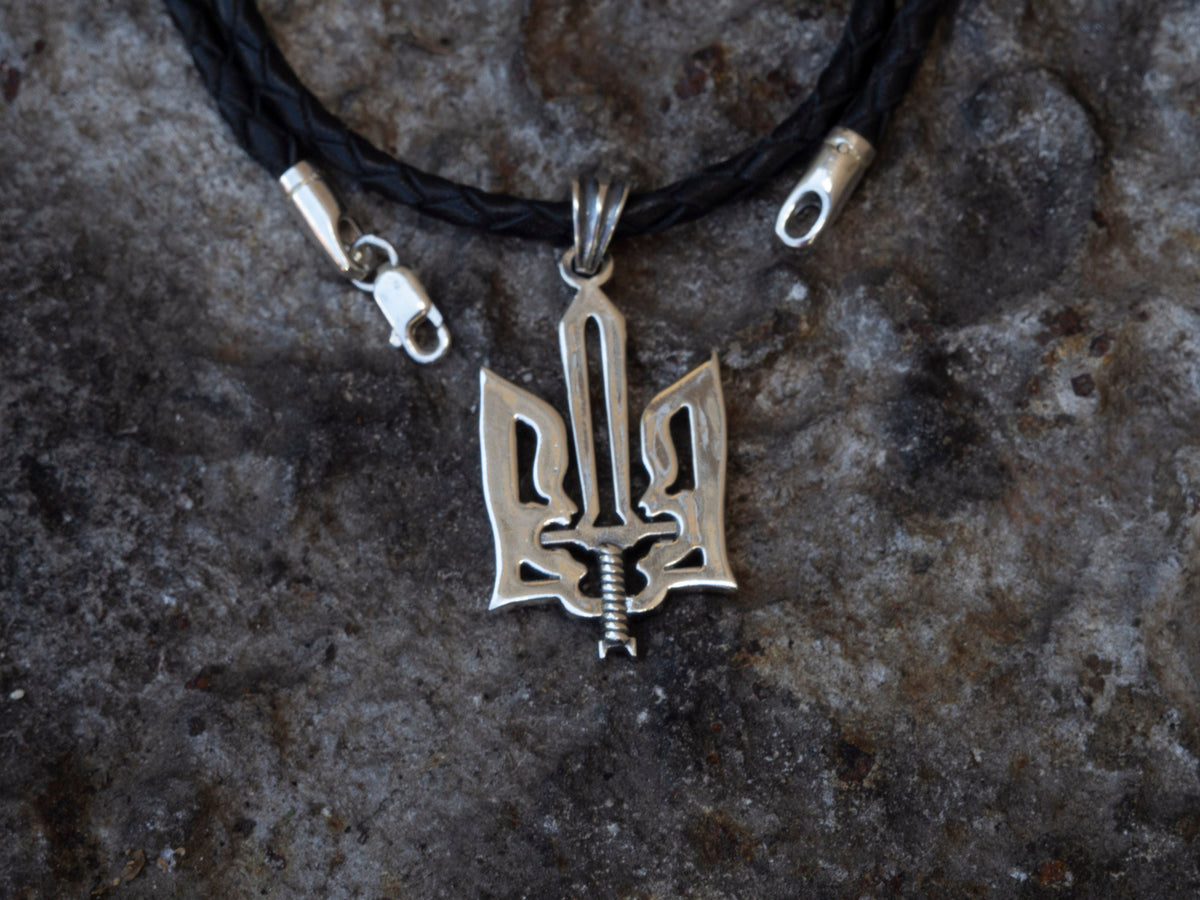 Oxidized 925 sterling silver Ukrainian Tryzub pendant with an integrated sword, 36 mm tall