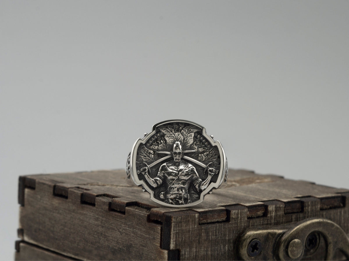 Ukrainian Warrior ring in 925 sterling silver featuring a detailed warrior relief, dark oxidized background, and polished ornamental border.