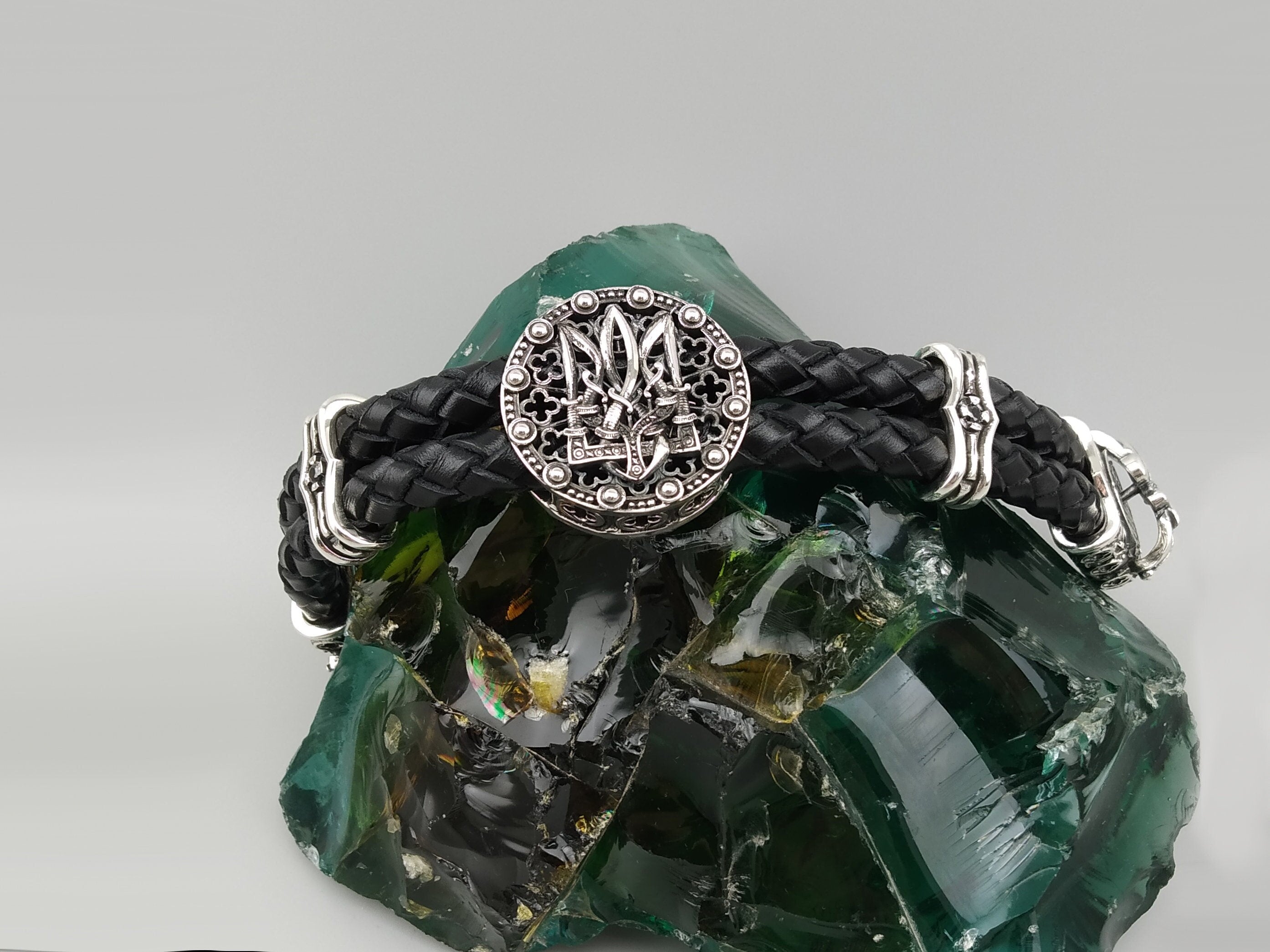 Cossack Freedom bracelet with black braided genuine leather, ornate 925 sterling silver centerpiece, and silver accents