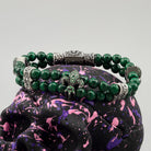 Handcrafted 73g solid sterling silver "Vivian" double-strand malachite beaded bracelet featuring a green pave Fleur-de-lis charm and detailed box clasp