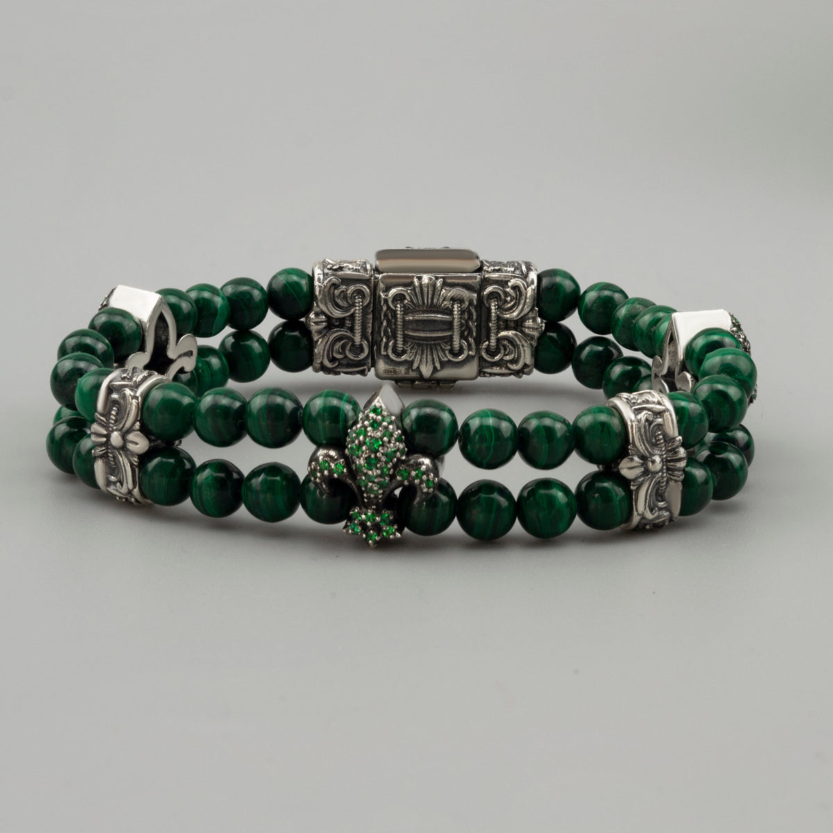 Handcrafted 73g solid sterling silver "Vivian" double-strand malachite beaded bracelet featuring a green pave Fleur-de-lis charm and detailed box clasp