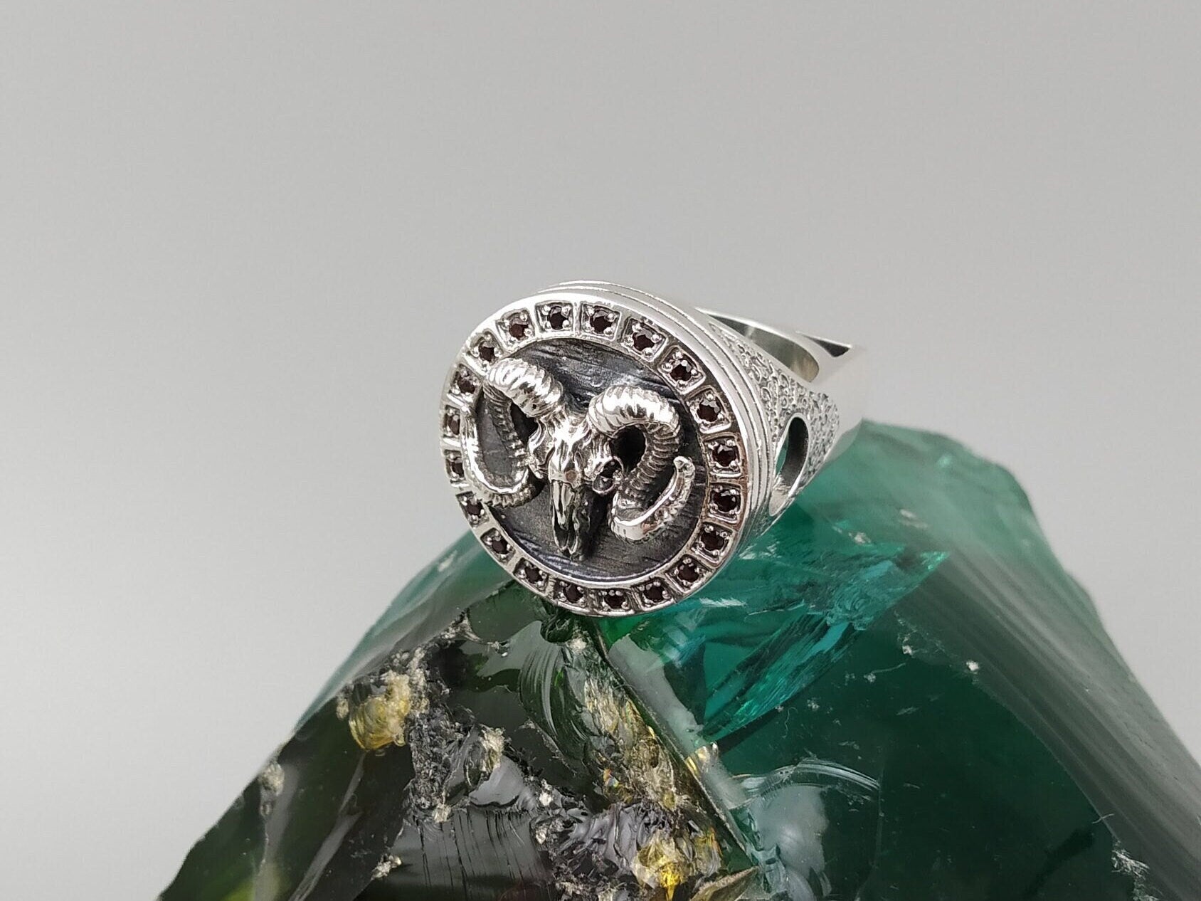 Mystic Ramhorn men's ring in 925 sterling silver with a sculpted ram head, curled horns, and dark cubic zirconia accents by Yeti Jewelry