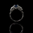 Atropos 925 sterling silver skull ring with blue cubic zirconia and gothic biker design