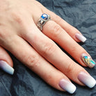 Atropos 925 sterling silver skull ring with blue cubic zirconia and gothic biker design