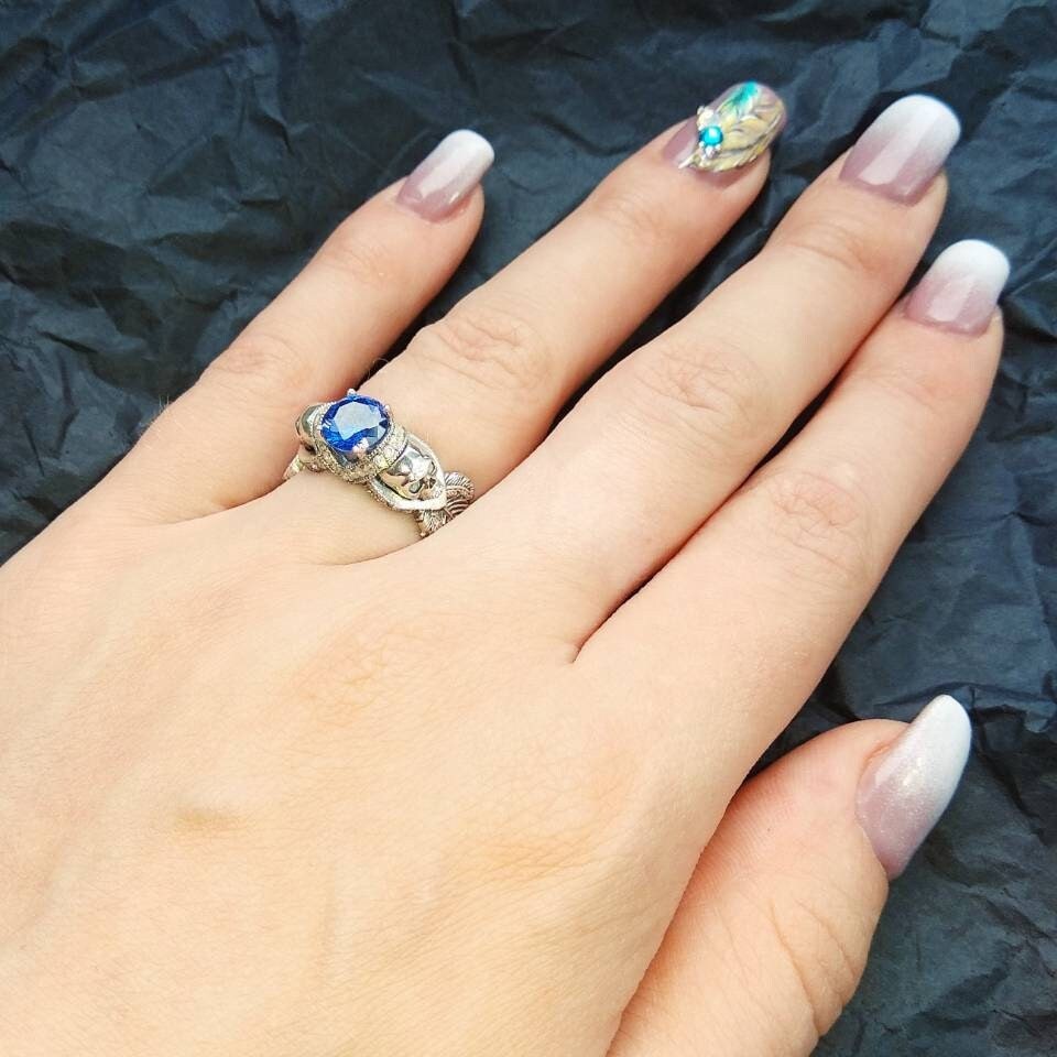 Atropos 925 sterling silver skull ring with blue cubic zirconia and gothic biker design
