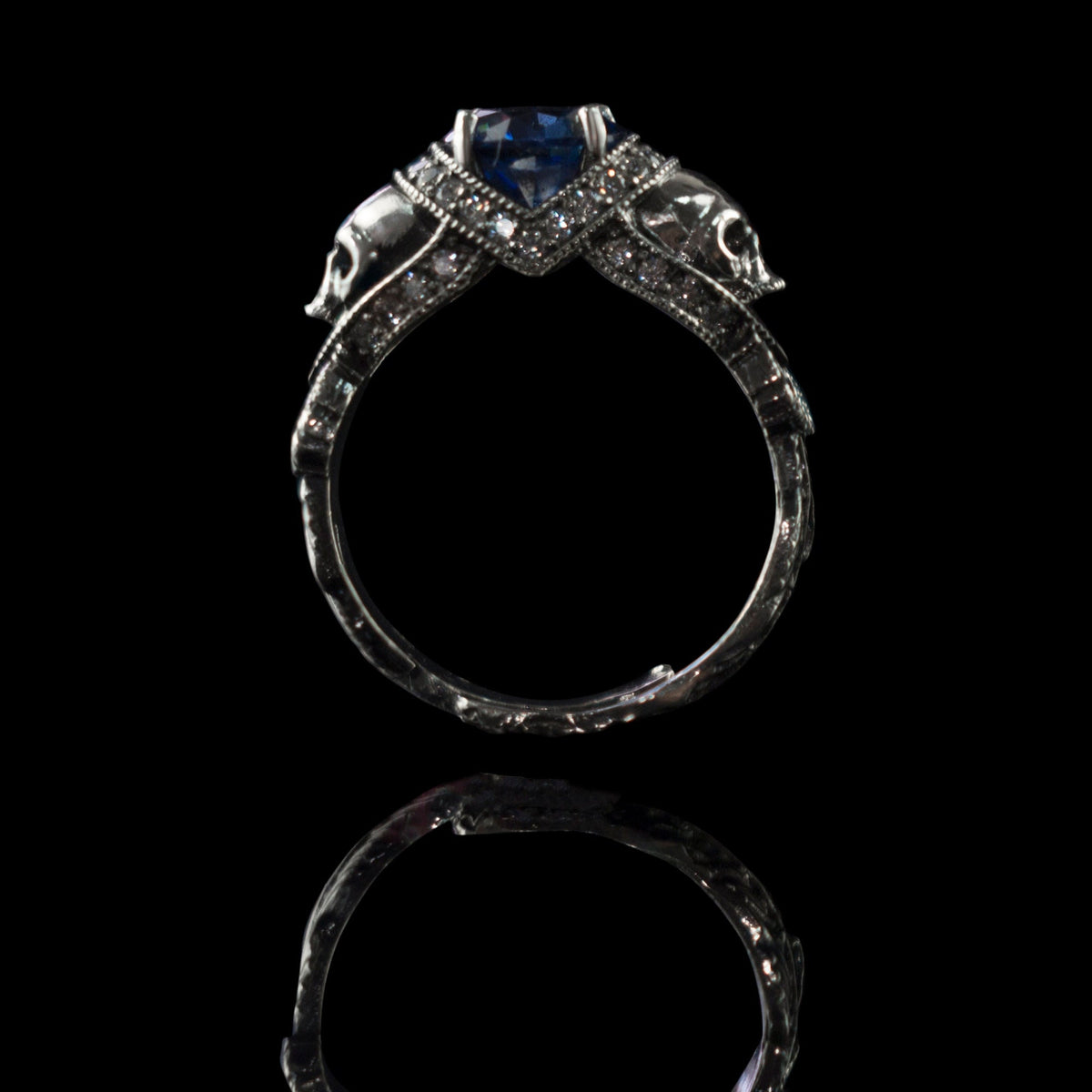 Atropos 925 sterling silver skull ring with blue cubic zirconia and gothic biker design