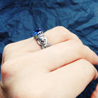 Atropos 925 sterling silver skull ring with blue cubic zirconia and gothic biker design