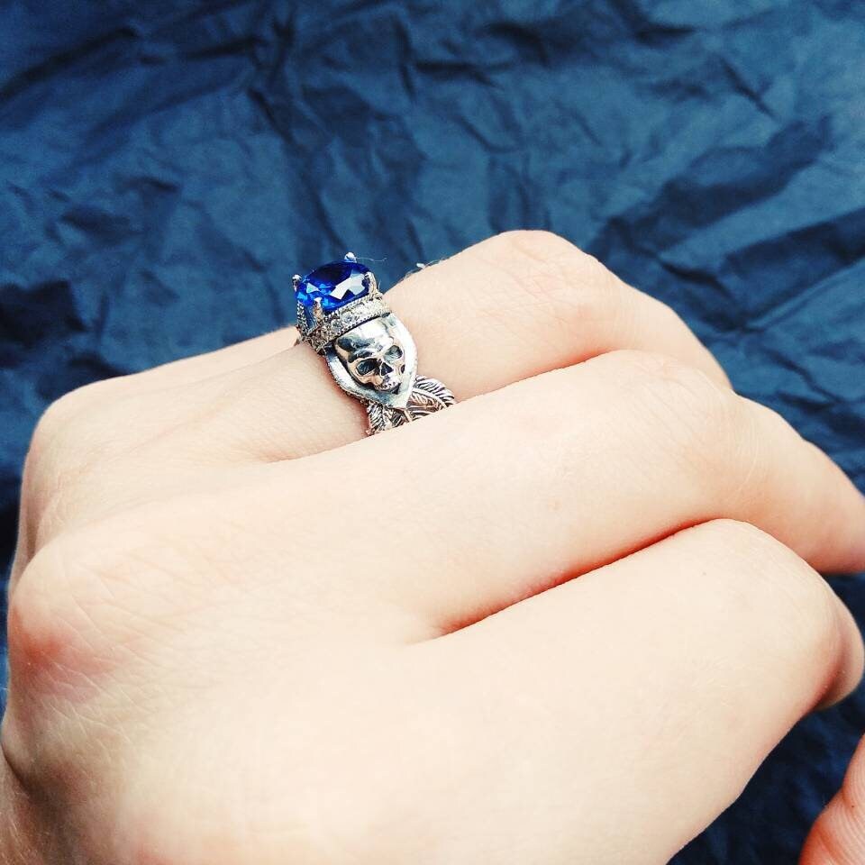 Atropos 925 sterling silver skull ring with blue cubic zirconia and gothic biker design