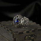 Octavius 925 sterling silver signet ring with deep blue cubic zirconia and gothic relief