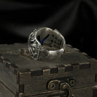 Octavius 925 sterling silver signet ring with deep blue cubic zirconia and gothic relief