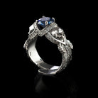 Atropos 925 sterling silver skull ring with blue cubic zirconia and gothic biker design