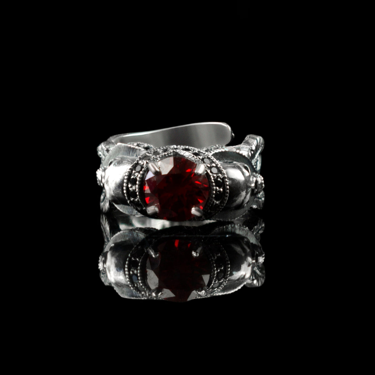 Atropos 925 sterling silver skull ring with red cubic zirconia and gothic biker design